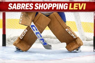 Devon Levi in Buffalo Sabres goalie gear during an AHL game with the Rochester Americans in 2025-26
