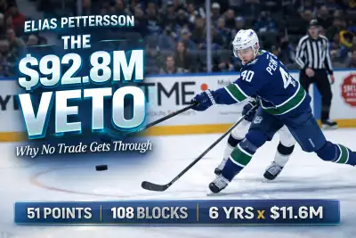 Elias Pettersson of the Vancouver Canucks looking forward in red jersey, center of trade rumors and $92.8M no-movement clause standoff with Jim Rutherford